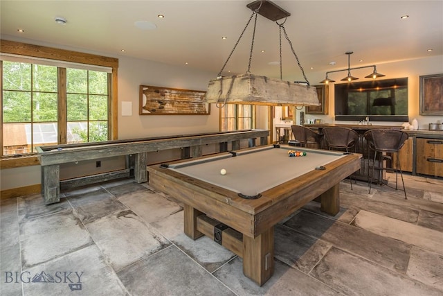 5933 Monforton School Rd, Bozeman, MT 59718 - playroom featuring pool table, wet bar, and stone finish flooring
