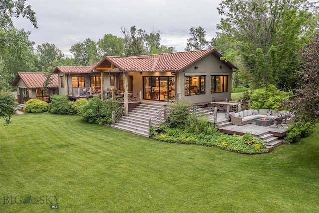 5933 Monforton School Rd, Bozeman, MT 59718 - rear view of house with a standing seam roof, an outdoor living space, a lawn, and metal roof