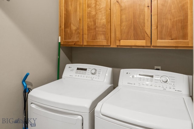 126 Pathfinder Trl, Bozeman, MT 59718 - laundry area with cabinet space and washer and clothes dryer