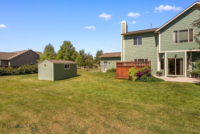 126 Pathfinder Trl, Bozeman, MT 59718 - view of yard featuring a storage shed and a patio