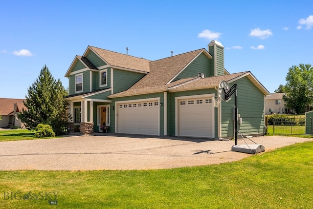 126 Pathfinder Trl, Bozeman, MT 59718 - view of front of home with an attached garage, asphalt driveway, a chimney, and roof with shingles