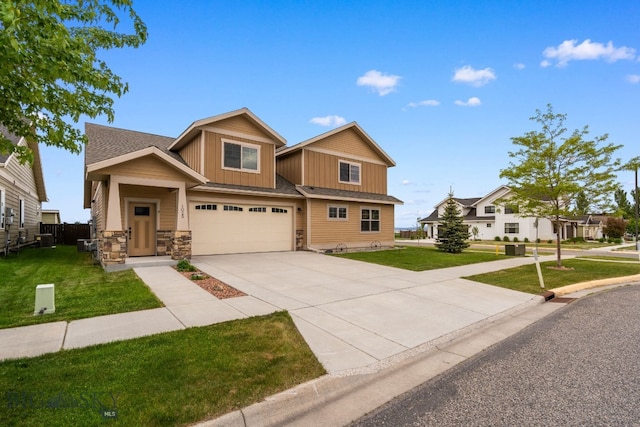 1025 Advance Dr, Bozeman, MT 59718 - craftsman-style home with an attached garage, concrete driveway, board and batten siding, stone siding, and a shingled roof
