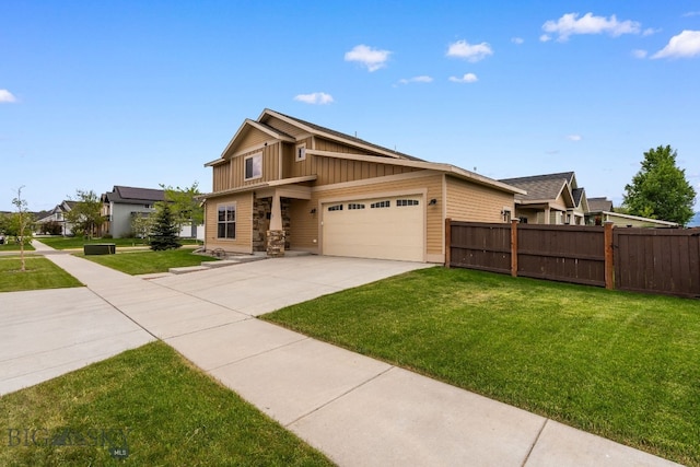 1025 Advance Dr, Bozeman, MT 59718 - view of front of home with board and batten siding, a garage, and concrete driveway
