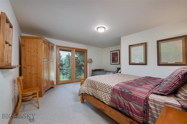 2415 Crazy Horse Rd, Big Sky, MT 59716 - bedroom with light colored carpet