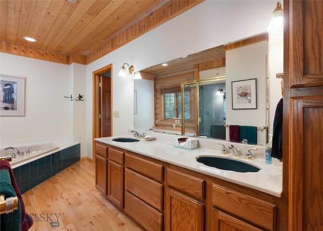 2415 Crazy Horse Rd, Big Sky, MT 59716 - full bath featuring a bath, wood ceiling, double vanity, wood finished floors, and a stall shower