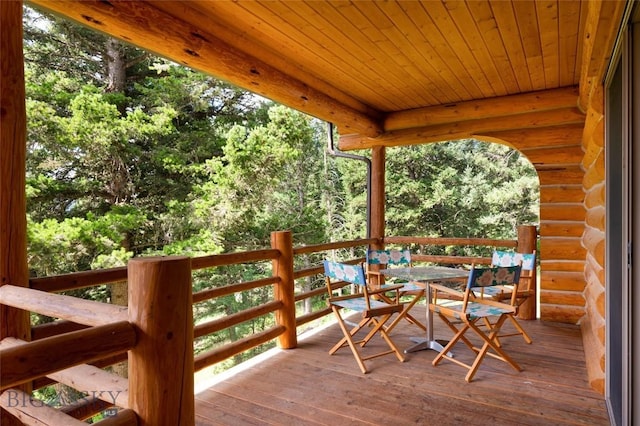 2415 Crazy Horse Rd, Big Sky, MT 59716 - wooden deck with outdoor dining area