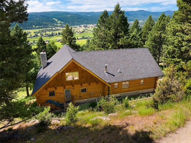 2415 Crazy Horse Rd, Big Sky, MT 59716 - aerial view of property and surrounding area featuring a mountainous background