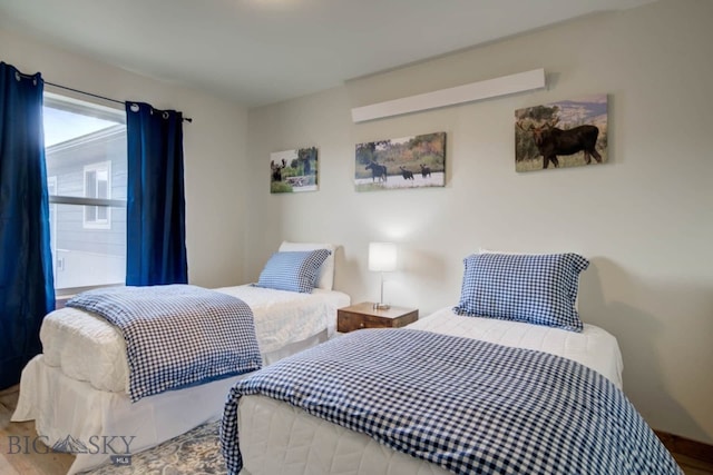 511 W Hugel, Ennis, MT 59729 - bedroom with wood finished floors