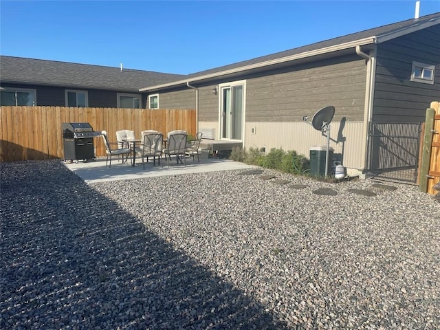 511 W Hugel, Ennis, MT 59729 - rear view of property with a patio