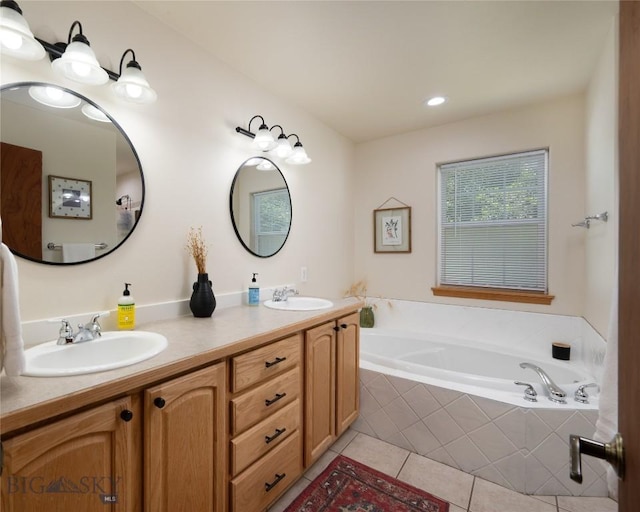 56 Green Belt Dr, Belgrade, MT 59714 - bathroom featuring tile patterned flooring, double vanity, and a bath