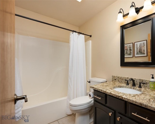 56 Green Belt Dr, Belgrade, MT 59714 - full bath with tile patterned flooring, vanity, toilet, and shower / bath combo with shower curtain