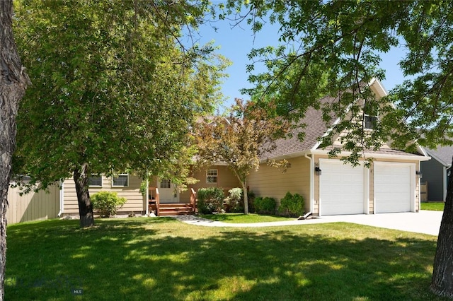 56 Green Belt Dr, Belgrade, MT 59714 - obstructed view of property with a front yard and driveway