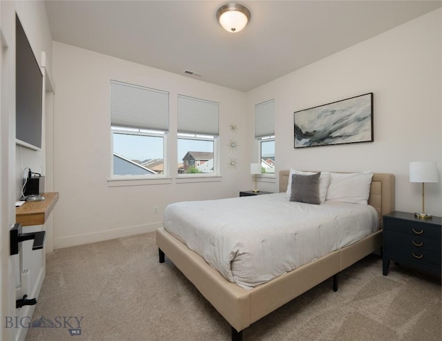 810 Butler Crk, Belgrade, MT 59714 - bedroom with light colored carpet and baseboards