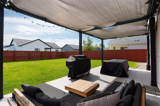 810 Butler Crk, Belgrade, MT 59714 - fenced backyard featuring area for grilling, a patio area, and an outdoor hangout area