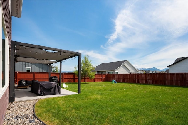 810 Butler Crk, Belgrade, MT 59714 - fenced backyard with a patio and a mountain view