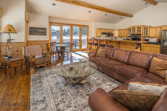48042 Gallatin Rd, Big Sky, MT 59730 - living area with wood-type flooring, french doors, and a wainscoted wall