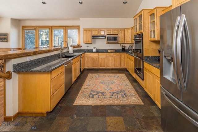 48042 Gallatin Rd, Big Sky, MT 59730 - kitchen featuring black appliances, a sink, glass insert cabinets, dark stone counters, and dark stone finish flooring