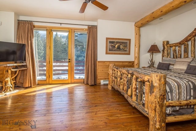 48042 Gallatin Rd, Big Sky, MT 59730 - bedroom featuring access to exterior, wood-type flooring, a baseboard radiator, and ceiling fan