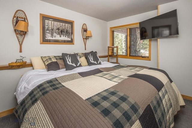 48042 Gallatin Rd, Big Sky, MT 59730 - bedroom with baseboards and carpet