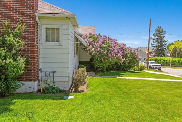 510 S Excelsior, Butte, MT 59701 - view of side of property with a yard and brick siding