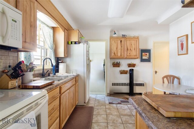 510 S Excelsior, Butte, MT 59701 - kitchen with white appliances, radiator, a sink, tasteful backsplash, and light brown cabinetry