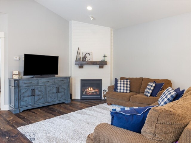 3171 Spring Ridge Dr, Bozeman, MT 59715 - living room with dark wood finished floors, lofted ceiling, and a fireplace