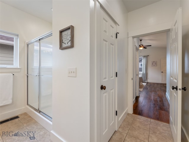 3171 Spring Ridge Dr, Bozeman, MT 59715 - hallway with light tile patterned floors and baseboards