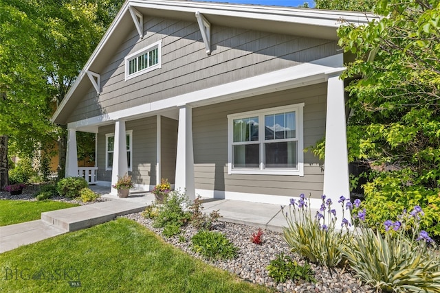 3171 Spring Ridge Dr, Bozeman, MT 59715 - view of front facade featuring a porch
