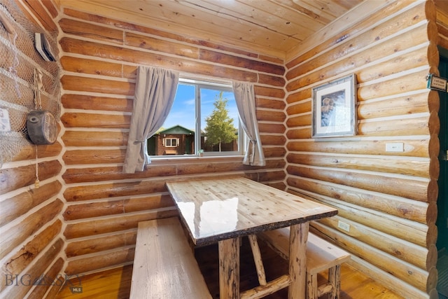 701 Bauer Ln Unit 2, Ennis, MT 59729 - unfurnished room featuring rustic walls, wood finished floors, and wood ceiling