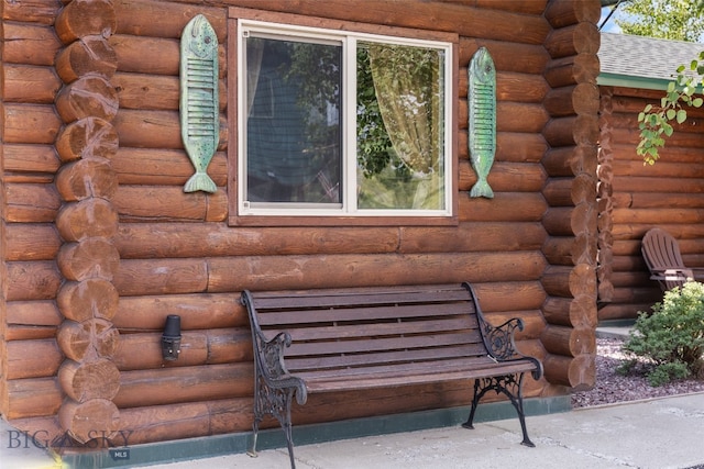 701 Bauer Ln Unit 2, Ennis, MT 59729 - exterior view of log siding