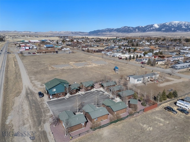 701 Bauer Ln Unit 2, Ennis, MT 59729 - aerial perspective of suburban area featuring a mountain backdrop