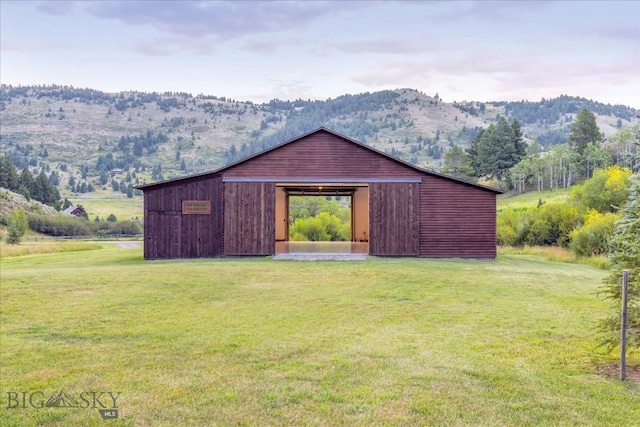 3011 Goose Creek Rd, Bozeman, MT 59715 - view of pole building with a lawn and a mountain view