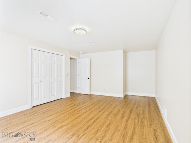 3405 W Fieldstone Dr, Bozeman, MT 59715 - unfurnished bedroom featuring light wood-style floors, baseboards, and a closet