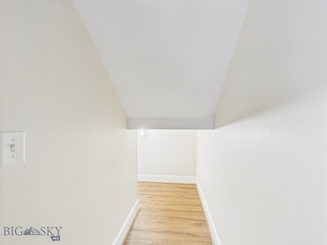 3405 W Fieldstone Dr, Bozeman, MT 59715 - interior space with wood finished floors, baseboards, and vaulted ceiling