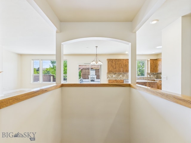 3405 W Fieldstone Dr, Bozeman, MT 59715 - hallway featuring arched walkways and recessed lighting