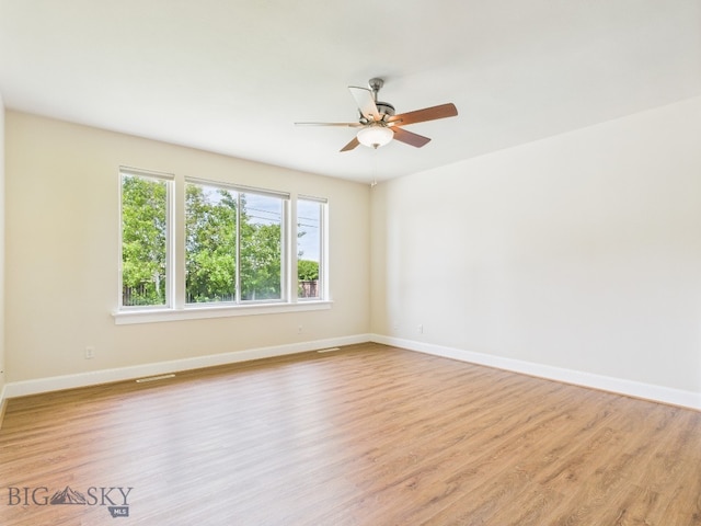 3405 W Fieldstone Dr, Bozeman, MT 59715 - empty room with baseboards, a ceiling fan, and light wood-style floors