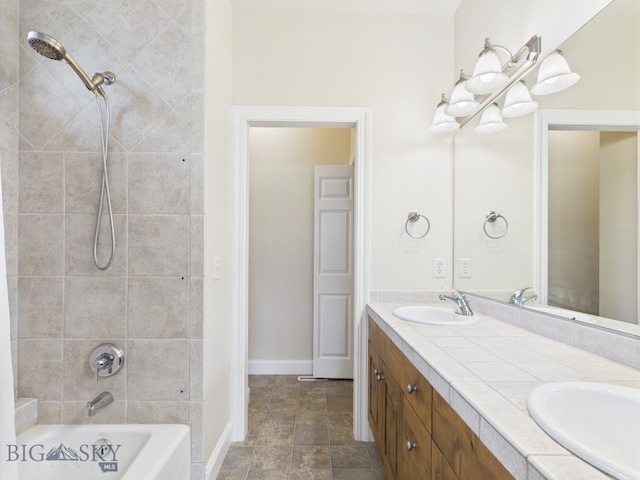 3405 W Fieldstone Dr, Bozeman, MT 59715 - bathroom featuring double vanity, shower / tub combination, and baseboards