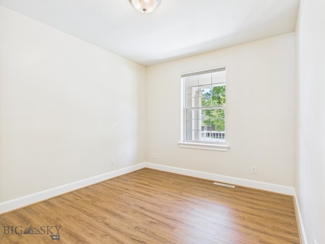 3405 W Fieldstone Dr, Bozeman, MT 59715 - unfurnished room featuring wood finished floors and baseboards