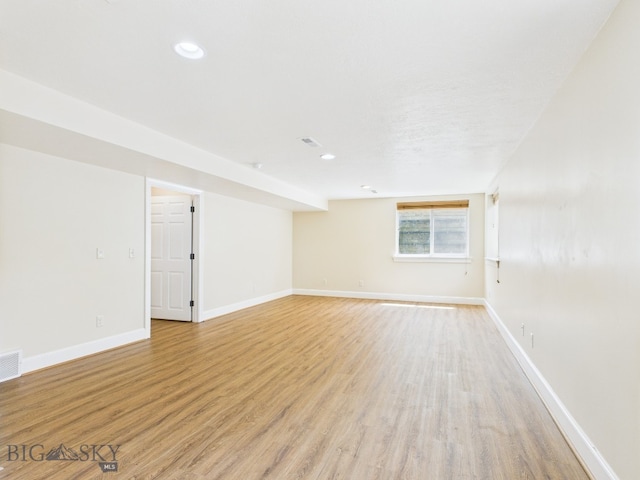 3405 W Fieldstone Dr, Bozeman, MT 59715 - spare room with light wood finished floors, baseboards, and recessed lighting