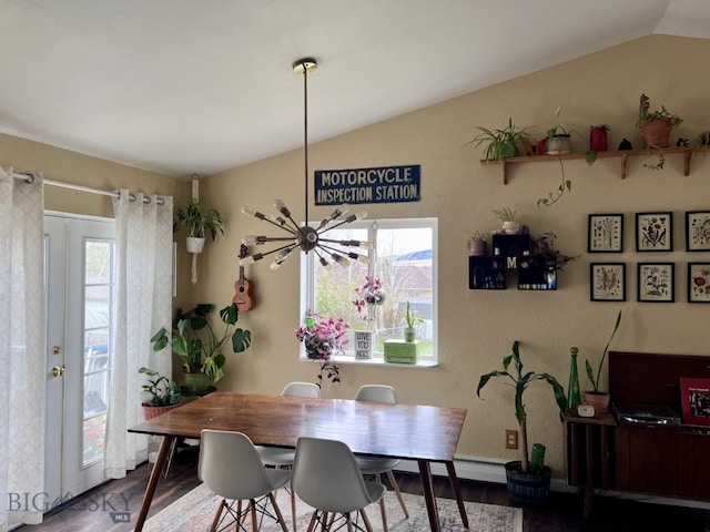 616 Comet, Livingston, MT 59047 - dining area featuring lofted ceiling, healthy amount of natural light, and wood finished floors