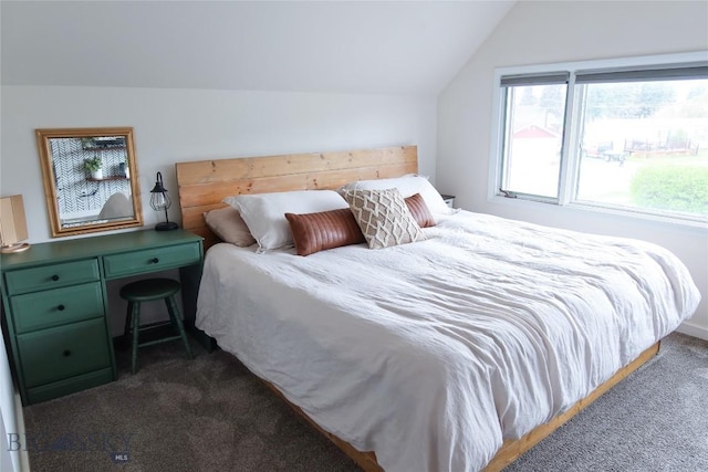 1905 Florence Ave, Butte, MT 59701 - bedroom featuring dark colored carpet and vaulted ceiling