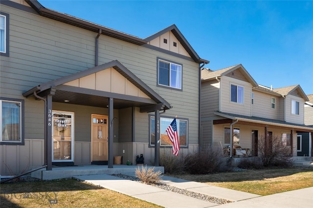 3650 Potosi St, Bozeman, MT 59718 - multi unit property featuring a porch, board and batten siding, and a front yard