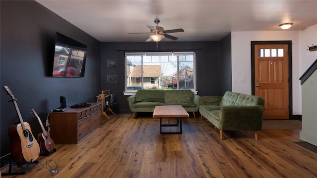 3650 Potosi St, Bozeman, MT 59718 - living room featuring wood finished floors, ceiling fan, and baseboards