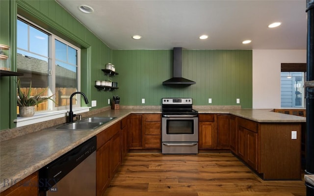 3650 Potosi St, Bozeman, MT 59718 - kitchen featuring wall chimney range hood, stainless steel appliances, a sink, healthy amount of natural light, and recessed lighting
