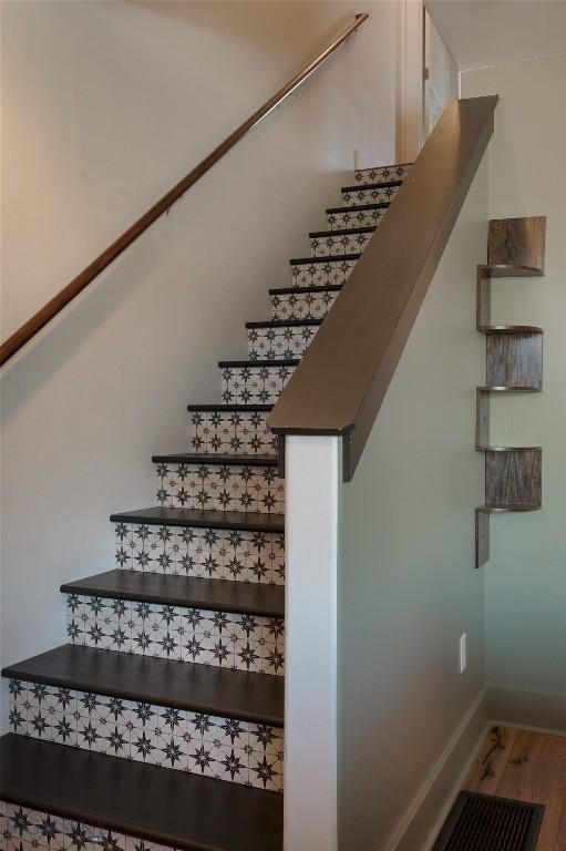 3650 Potosi St, Bozeman, MT 59718 - stairs with baseboards and wood finished floors