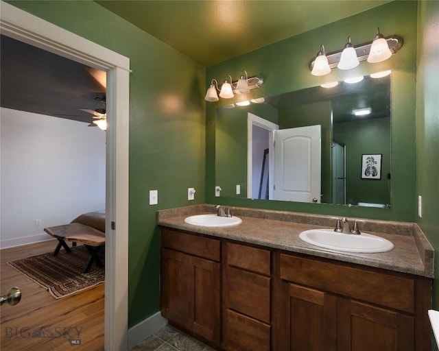 3650 Potosi St, Bozeman, MT 59718 - bathroom with double vanity, baseboards, and a ceiling fan