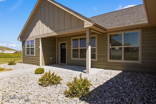 30 Blue Stem Way, Three Forks, MT 59752 - back of house with board and batten siding and roof with shingles