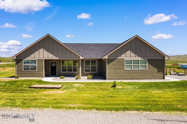 30 Blue Stem Way, Three Forks, MT 59752 - view of front of property with board and batten siding, a front lawn, and a shingled roof