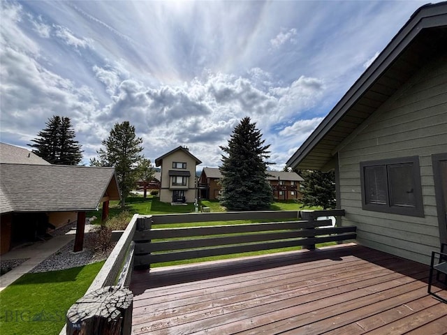 2225 Black Otter Rd Unit 23, Big Sky, MT 59716 - wooden deck with a yard