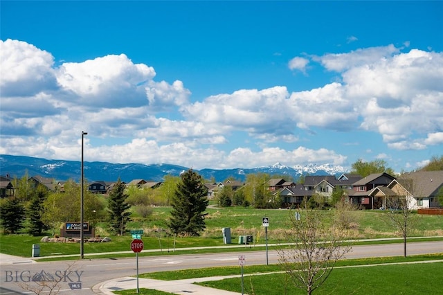 476 Enterprise Blvd Unit 207, Bozeman, MT 59718 - surrounding community with a mountain view, a yard, and a residential view